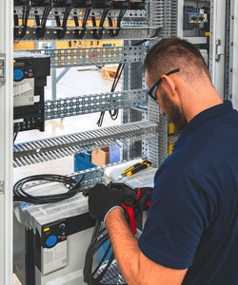 electrician-working-on-electrical-panel (1)